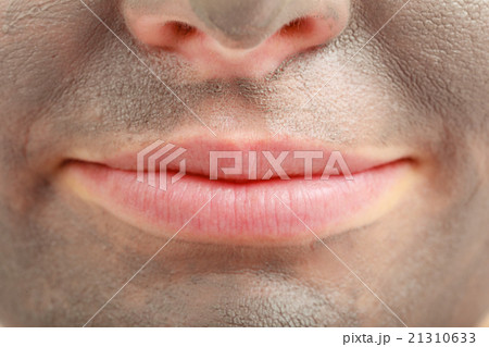 Closeup female face with clay mud facial mask 21310633