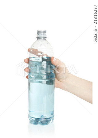 Woman opens a water bottle Woman opens a water bottle 21316237