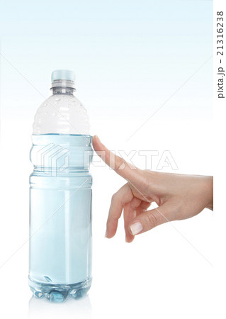 Woman opens a water bottle 21316238