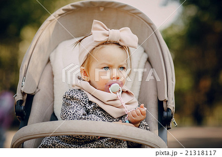 young family walking in the park young family walking in the park 21318117