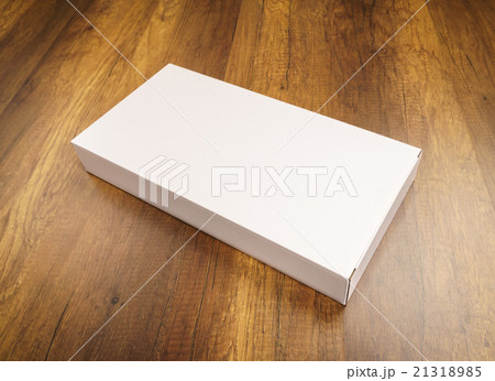 Blank white box mock up on wood background Blank white box mock up on wood background 21318985