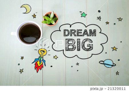 Dream Big concept with a cup of coffee Dream Big concept with a cup of coffee 21320011