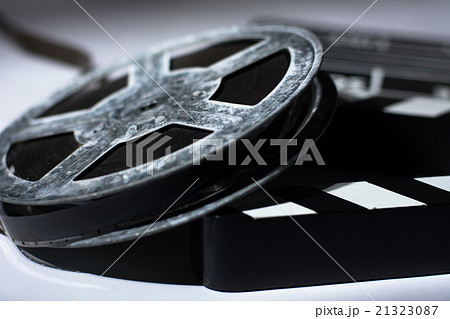 Old rusty metal reel of film and cinema clap Old rusty metal reel of film and cinema clap 21323087