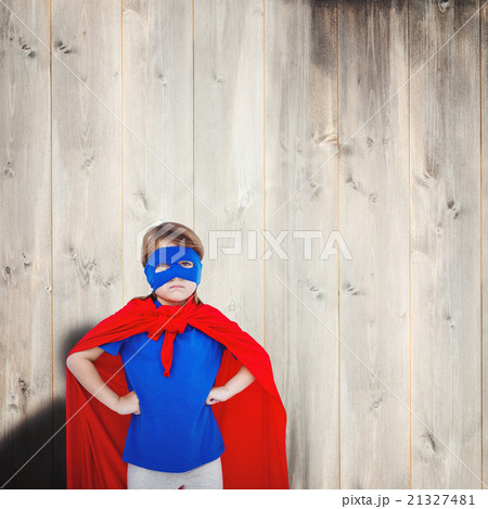 Composite image of masked girl pretending to be superhero 21327481