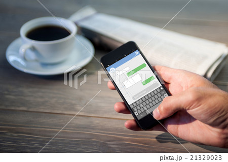 Composite image of smartphone text messaging Composite image of smartphone text messaging 21329023