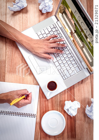 Composite image of part of hands typing on laptop Composite image of part of hands typing on laptop 21329071