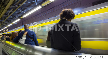 Passengers traveling by Tokyo metro. 21330419