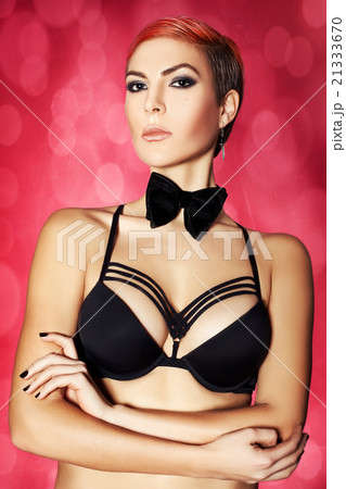 Portrait of a girl with folded hands 21333670