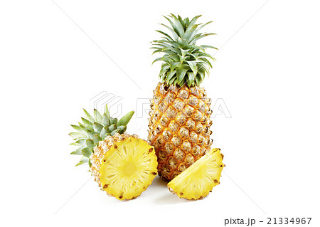 Pineapple with slices on  white background. 21334967
