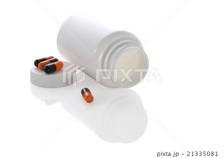 few pills with white jar and bottle 21335081
