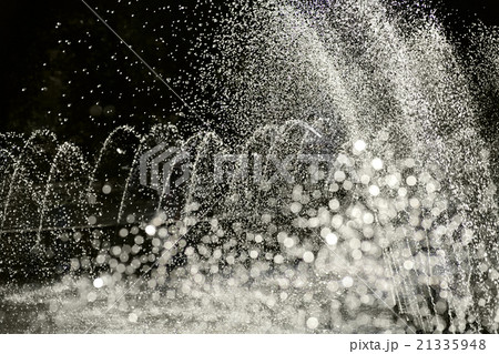 Fountain water jets in park partially blurred Fountain water jets in park partially blurred 21335948