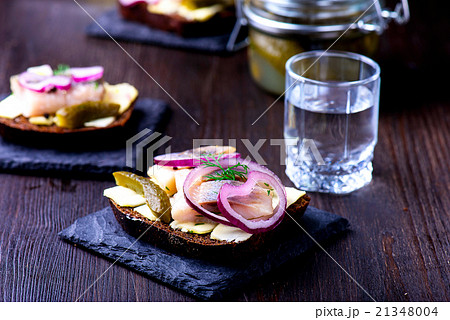 Herring sandwich with vodka glass Herring sandwich with vodka glass 21348004