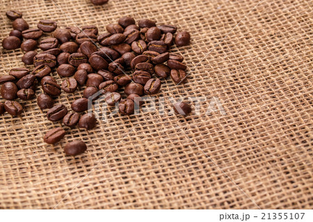 Beautiful coffee beans on the background  21355107