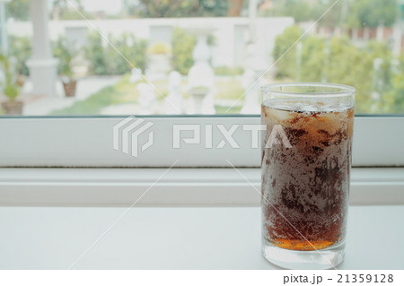 Cola with ice cubes Cola with ice cubes 21359128
