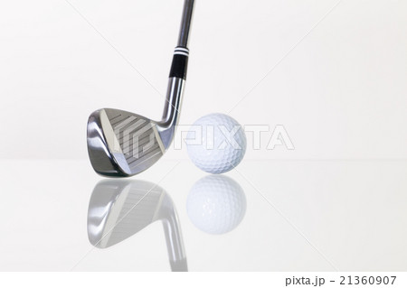 Golf club and golf ball on the glass desk 21360907