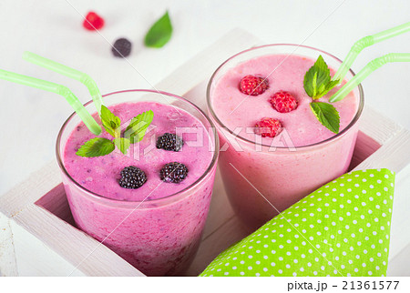 Raspberry and blackberry dairy smoothies  21361577