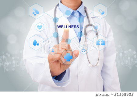Doctor hand touching WELLNESS sign  21368902