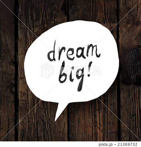 "Dream big" lettering in speech bubble on wooden 21369732