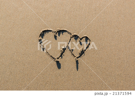 Couple sign valentine's on the beach. Couple sign valentine's on the beach. 21371594