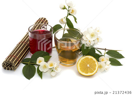two mugs of hot drinks, two flowers two mugs of hot drinks, two flowers 21372436