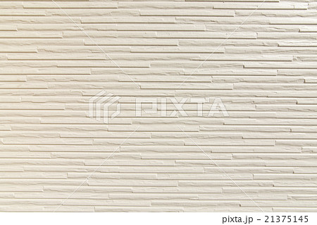 住宅 外壁 建材 サイディング 窯業系 ベージュ クリーム 横ピッチの写真素材