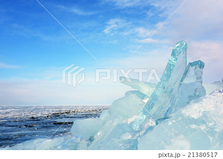 Transparent blue ice formation on the frozen lake 21380517