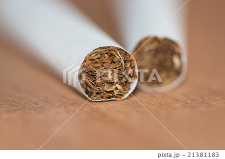 Tobacco in the cigarette selective focus image Tobacco in the cigarette selective focus image 21381183