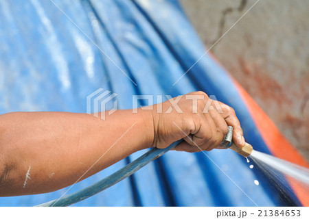 Workers spraying anti termite chemical treatment 21384653