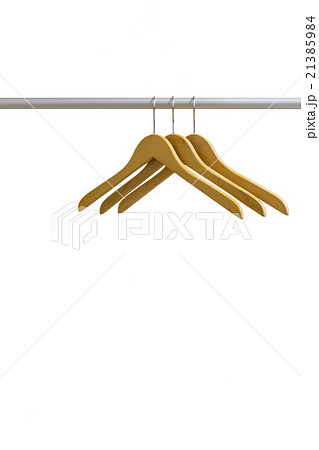 Wood coat hanger isolated on the white background 21385984