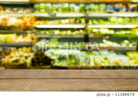 Wood floor and Supermarket blur background Wood floor and Supermarket blur background 21386679