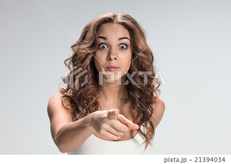 The happy woman on gray background 21394034