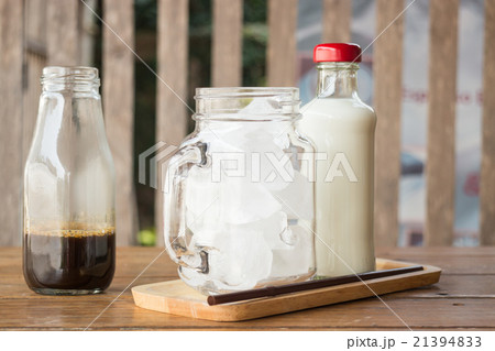 Homemade iced coffee ingredient on wooden table Homemade iced coffee ingredient on wooden table 21394833