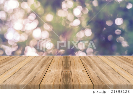 Wooden board empty table blur trees in forest. 21398128