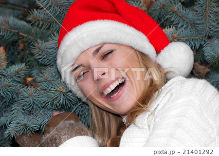 Portrait beauty girl in santa red cap 21401292