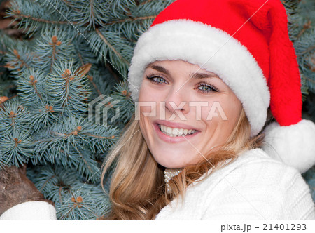 Portrait beauty girl in santa red cap Portrait beauty girl in santa red cap 21401293