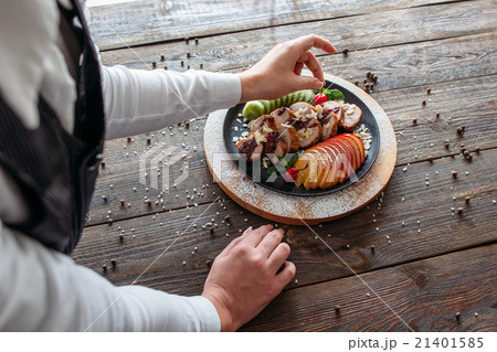 Chief decorated baked veal with fresh cherry Chief decorated baked veal with fresh cherry 21401585