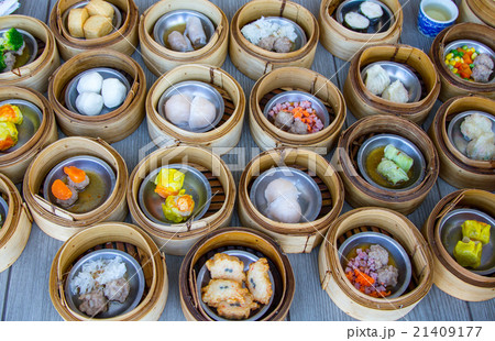 various dim sum in bamboo steamer  21409177