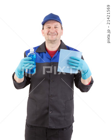 Man holds spray bottle and sponge. 21421569