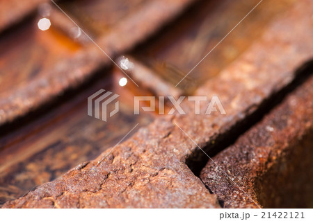 Close up of the rusty metal manhole cover 21422121