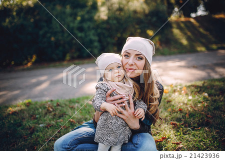 young family walking in the park 21423936