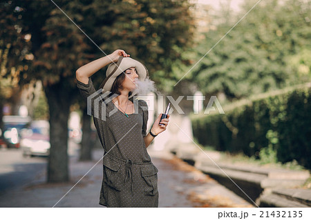 Girl with E-cigarette Girl with E-cigarette 21432135