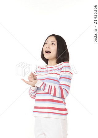 ひらめきポーズの若い女性の写真素材