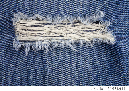 Jeans torn denim texture. 21438911