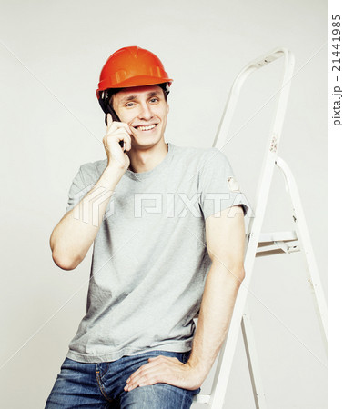 young real hard worker man isolated on white 21441985
