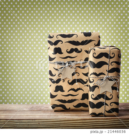 Mustache pattered gift boxes with star shaped tags Mustache pattered gift boxes with star shaped tags 21446036
