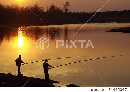 Two men fishing on river Two men fishing on river 21446047