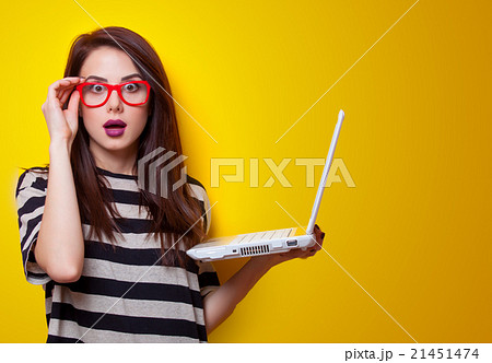 portrait of young woman with laptop portrait of young woman with laptop 21451474