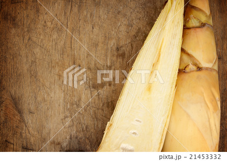 Bamboo shoot on wood background Bamboo shoot on wood background 21453332