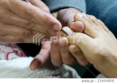 professional doing manicure pedicure professional doing manicure pedicure 21454858