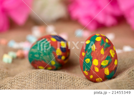 painted egg on burlap 21455349